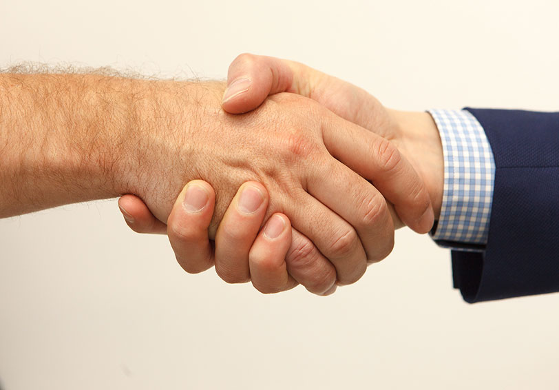 Lund's Philosophy: Handshake, partnership